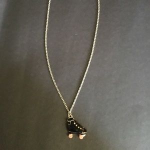 Silver black and pink roller skate necklace
